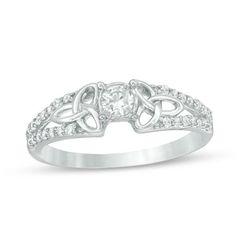 a white gold ring with diamonds on it