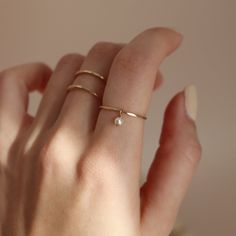 A dainty pearl ring that will be an instant classic in your jewelry collection. DETAILSRing sizes 4-14Choose from 14k Gold Fill or Sterling Silver Woman Ring Gold, Minimal Rings Gold, Minimal Rings Minimalist Jewelry, Minimal Rings, Modern Gold Ring, Minimal Gold Jewelry, Rings And Necklaces, Minimal Gold, Dainty Rings