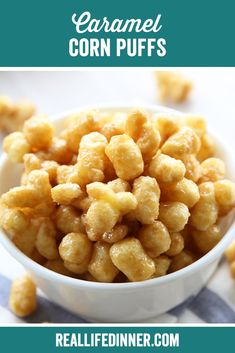 a white bowl filled with corn puffs on top of a checkered table cloth