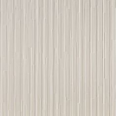 a white wall with vertical lines on it