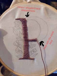 an embroidery project with the letter f on it's side and instructions for how to sew