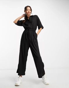 ASOS DESIGN oversized tie waist shirt jumpsuit in black | ASOS Casual Collared Belted Jumpsuits And Rompers, Casual Collared Jumpsuits And Rompers For Work, Casual Belted Collared Jumpsuits And Rompers, Trendy Collared Jumpsuits And Rompers For Workwear, Chic Relaxed Fit Jumpsuits And Rompers With Tie Waist, Chic Jumpsuits With Tie Waist And Relaxed Fit, Black Button-up Jumpsuits And Rompers, Relaxed Fit Collared Jumpsuits And Rompers For Work, Black Relaxed Fit Jumpsuit For Workwear