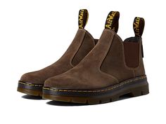 Dr. Martens Work Hardie II - Shoes : Dark Brown Waxy Suede Waterproof : Stay trendy and stylish effortlessly on various occasions wearing the Dr. Martens Work Hardie II Boots. Leather or suede upper. Leather lining that wicks moisture. SoftWair lining. Removable SoftWair insole. Slide style. Monochromatic design. Pull-tabs on the front and back. Soft toe. PVC outsole. Imported. Measurements: Weight: 1 lb 6 oz Product measurements were taken using size UK 7 (US Men's 8, US Women's 9), width Mediu Fall Streetwear Boots With Cushioned Footbed, Casual Brown Slip-on Boots, Suede Boots With Branded Insole For Streetwear, Casual Boots With Removable Insole For Streetwear, Casual Streetwear Boots With Removable Insole, Casual Suede Boots With Reinforced Heel, Casual Slip-on Boots With Reinforced Toe, Suede Slip-on Boots With Cushioned Footbed, Brown Suede Boots For Streetwear