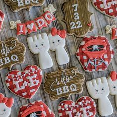 decorated cookies are arranged on a table for someone's birthday or other special occasion