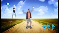 a man standing in the middle of a dirt road with his hands up and arms outstretched