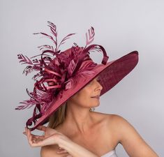 Burgundy wide brim hat oval shape couture classical hat for elegant ladies. Pink on a top of the hat and burgundy on the bottom part of the brim. Wear it at the weddings, or church or Ascot or Derby or club events- you will be definitely make a statement! This hat is made of 2 tone sinamay and adorned with hand trimmed feather sprays . It can be made in a wide range of colors and sizes. Please email me about the options and I'll try to make sure it happens for you. Also I'll make it fit right fo Burgundy Wedding Hat, Luxury Red Hats For Races, Luxury Red Hat For Kentucky Derby, Luxury Red Fedora For Kentucky Derby, Luxury Hat With Short Brim For Royal Ascot, Luxury Wide Brim Hat For Kentucky Derby, Luxury Short Brim Hat For Royal Ascot, Elegant Spring Hat For Fashion Events, Luxury Hats For Kentucky Derby Races