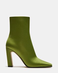 Indulge in luxury with the LIZABELLE bootie. Its sleek design and square toe add sophistication to any look. This ankle boot elevates your style and provides unmatched comfort. 3.5 inch heel height 10 inch shaft circumference 5.5 inch shaft height Textile upper material Leather lining Synthetic sock Synthetic sole Imported Green Boots Outfit, Square Toe Ankle Boots, Green Pencil Skirts, Women's Booties, Fashion Moodboard, Green Boots, Green Square, Skirts With Boots, Black Tweed