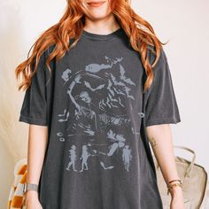 Halloween Comfort Colors® Unisex T-shirt, Retro 90's Grunge Aesthetic Shirt, Dark Art Grunge Punk Tee, Grunge Punk Aesthetic Clothing COMFORT COLORS 1717 UNISEX T-SHIRT ✨ SIZE GUIDELINES ✨ - This shirt fits true to size - If you want a comfortably fitted look, I recommend sticking with your regular t-shirt size - If you want a slightly oversized fit, I recommend sizing up one size - If you want a true oversized fit, I recommend sizing up two to three sizes ✨ You can contact me for more color, si Fairy Grunge Crew Neck T-shirt With Graphic Print, Fairy Grunge Cotton T-shirt With Graphic Print, Halloween Graffiti Print Short Sleeve Tops, Halloween Anime Print Grunge T-shirt, Halloween Graffiti Print Crew Neck Top, Halloween Graffiti Print Crew Neck T-shirt, Grunge Style T-shirt With Graffiti Print, Grunge T-shirt With Graffiti Print And Relaxed Fit, Grunge Style Relaxed Fit T-shirt With Graffiti Print