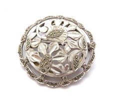 The brooch is formed from silver tone textured and polished metal in an art nouveau revival style abstract leaf design, with marcasite detailing to the leaf centers and the border of the brooch .  The brooch is signed Sphinx to the back.  Circa 1950's - 60's.  Sphinx jewellery is a collectable vintage British UK Jewellery brand. The company was started in the late 1940′s by S Root and was based in Chiswick, London.  They were known for their well made, statement costume jewellery pieces , produc Art Nouveau Revival, Chiswick London, Gold Art Nouveau Brooches For Gift, 50s Jewelry, 60s Jewelry, 70s Jewelry, Art Nouveau Gold Brooch With Cabochon, Luxury Art Nouveau Cabochon Brooch, Collectible Art Nouveau Hallmarked Brooch