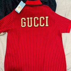 New! 100 Percent Authentic. Never Worn ! With Tags Red Gucci Cotton Top, Casual Red Gucci Tops, Designer Red Long Sleeve Tops, Designer Long Sleeve Red Top, Gucci Luxury Collared Shirt, Luxury Gucci Collared Shirt, Designer Gucci Polo Collar Top, Designer Gucci Collared Shirt, Gucci Polo Shirt