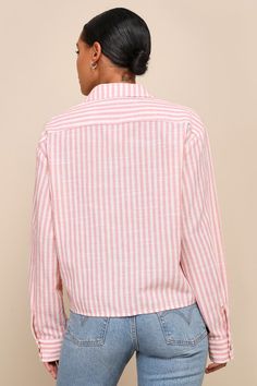 Cute and casual vibes come together to create the trendy look that is the Lulus Chic Marvel Pink and Ivory Striped Button-Up Long Sleeve Top! Breezy, cotton-blend woven fabric, with a white and pink striped pattern throughout, shapes a classy collared neckline and long sleeves with drop shoulders and button cuffs. An oversized, cropped bodice features a front patch pocket and functional button placket at the center. Fit: This garment fits true to size. Length: Size medium measures 22.50" from sh Trendy Shirt With Buttoned Pockets, Trendy Summer Tops With Buttoned Pockets, Summer Cotton Blouse With Buttoned Pockets, Trendy Cotton Blouse With Button Closure, Cotton Shirt For Fall Vacation, Chic Spring Tops With Buttoned Pockets, Trendy Spring Top With Roll-up Sleeves, Trendy Tops With Roll-up Sleeves For Spring, Spring Vacation Shirt With Button Cuffs