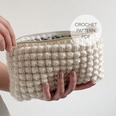 a woman's hand holding a crochet purse over her left shoulder with the words crochet pattern on it