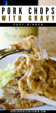 pork chops with gravy on a white plate