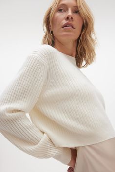 The Nova ribbed crewneck is the go-to for a luxe lounge look. Complete the set with the Keira ribbed shorts. 246 grams of 100% pure cashmere in 12-gauge knit Crewneck sweater Cropped Ribbed throughout 19" length (size small) Dry Clean Only All sale items are FINAL SALE. White Sweater Blank, Knit Sweaters Cropped, White Cropped Sweaters, Luxury Casual Cashmere Cropped Sweater, Cropper Knit Sweaters, White Cropped Knit Sweater, Cashmere Sweater White, Luxe Lounge, Lounge Looks