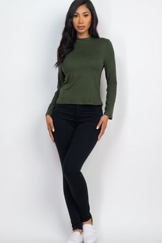 Mock neck solid long sleeve top from Capella Apparel Soft & light weight, high stretch jersey Style number: BT2662 Fabric Details: 92% Polyester, 8% Spandex Model is 5'8" and is wearing a Small