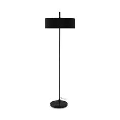 a floor lamp with a black shade on the base and a white light behind it