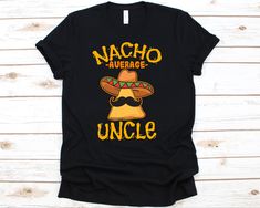 a black shirt with the words nacho average boss on it and an image of a sombrero