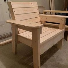 a chair made out of wood sitting in a room