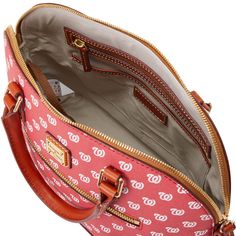 A Home-Run Hit  Support your team in style with our officially licensed MLB Collection. Washington Nationals, Dooney And Bourke, Dooney & Bourke, Dooney Bourke, Sling Backpack, In Style, Mlb, Zip Pockets, Satchel