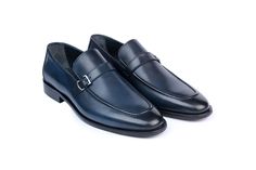 Cardo- our Simple handsome Navy Blue Monkstap loafer, thos elongated front toe box with its almond toe looks the part every occasion. Dress it up or down, made of Italian calf leather and a Classic over stitch around the toebox.Enjoy wearing this shoe with our Microlite sole for extra comfort. *Fine leather upper and lining *Non removable padded insole *Durable Microlite outsole *Handmade in TURKEY Classic Blue Loafers For Business Casual, Classic Blue Leather Shoes For Work, Elegant Blue Formal Loafers, Elegant Blue Loafers For Formal Occasion, Classic Blue Dress Shoes For Work, Classic Blue Plain Toe Loafers, Luxury Blue Leather Shoes For Business Casual, Classic Blue Goodyear Welted Loafers, Classic Blue Semi-formal Dress Shoes