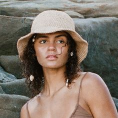 The perfect, minimal vegan bucket hat that will surely become a staple in your wardrobe. Made by hand from naturally-dyed, cabuya plant fiber. A cute, packable hat made by hand and in small batches by our talented women artisan group, this will be your new favorite companion for sunshine-soaked days. Our hats are handmade and one-of-a-kind. This means that no two are exactly alike and almost all contain irregularities from size to color. Please allow for slight imperfections as this is what adds Unisex Crochet, Summer Bucket Hat, All Natural Makeup, Packable Hat, Ethical Shopping, Crochet Bucket Hat, Carbon Offset, Plant Fibres, Summer Bucket