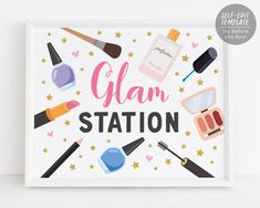 a sign that says glam station surrounded by cosmetics and makeup items on it's side