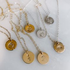 Your choice of stamp on this 13mm medium coin necklace with a dainty chain. Smooth or hammered edges, you pick! Available in 14k gold fill or sterling silver. 18" length. If you would like to request a different length, please leave note below. Hammered Round Disc Coin Necklace As Gift, Hammered Coin Necklace As Gift, Dainty Hand Stamped Round Disc Necklaces, Dainty Hand Stamped Round Disc Necklace, Everyday Hammered Round Disc Coin Necklace, Everyday Stamped Round Disc Charm Necklaces, Everyday Stamped Round Disc Charm Necklace, Nickel Free Everyday Round Disc Charm Necklace, Everyday Nickel-free Round Disc Charm Necklaces