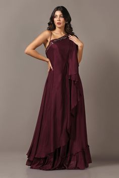 Wine one-shoulder drape style gown with delicate sequin embroidery crafted in diamond chiffon.
Components: 1
Pattern: Embroidered
Type Of Work: Sequin
Neckline: One-Shoulder
Sleeve Type: Asymmetric
Fabric: Diamond Chiffon
Color: Wine
Occasion: Party - Aza Fashions Pre-draped Prom Gown With Asymmetrical Neckline, Pre-draped Gown With Asymmetrical Neckline For Prom, One-shoulder Chiffon Evening Dress For Wedding, Sequin Chiffon Evening Dress For Gala, Embellished One Shoulder Evening Dress Floor-length, One-shoulder Georgette Wedding Dress, One Shoulder Georgette Wedding Dress, Embellished Floor-length One Shoulder Evening Dress, Elegant Georgette Evening Dress With Sequins