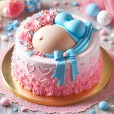 there is a cake with a baby doll on it