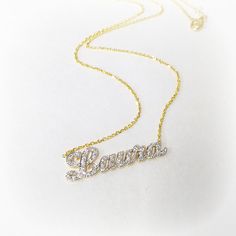 "Our Cutoff Date for Christmas delivery is Sunday Dec. 13, 2020 All Order placed after this date will be completed for mid January delivery. Personalized gold and diamond name necklace 1.25\" wide and about 1mm thick, made of solid 14k Yellow gold and Diamonds. The necklace suspends from a cable Link chain with 3 choices of length: 14\",16\", 18\" and 20\". The necklace can be made with the name of your choice up to 7 letters. A Great gift for Christmas Valentines, Birthday, Anniversary or any o Personalized White Diamond Jewelry Gift, Anniversary Cubic Zirconia Nameplate Jewelry, Personalized White Gold Luxury Diamond Necklace, Gold Name Necklace With Diamond Accents, Yellow Gold Nameplate Jewelry With Diamond Accents, Luxury Nameplate Necklace With Diamond Accents, Luxury Round Name Necklace For Anniversary, White Gold Diamond Name Necklace Gift, Diamond Name Necklace In White Gold For Gift