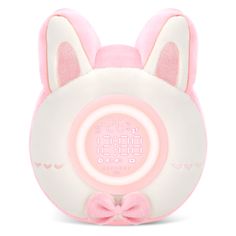 a pink and white alarm clock with ears