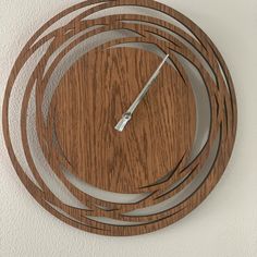 a clock made out of wood and metal