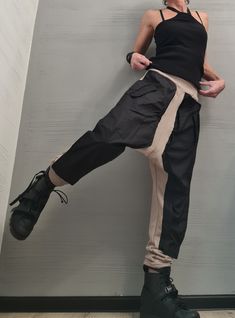 "New collection Extravagant Pants, Harem Casual Pants, Loose Pants, Cotton Pants, Gothic Pants, Outer pockets, Beige & black ❤️ Extravagant designs and high quality fabrics! ❤️ Materials & Care Cotton, Polyester Hand wash at low temperatures. Do not machine dry. Do not iron. Do not dry clean! ❤️ Sizing We can make your piece from XS to 5XL! Everything in the shop can be also made according to your measures free of charge! ❤️ Shipping ✈ Ready to ship The time I need to prepare an order for shippi Shorts Ideas, Pants Ideas, Gothic Pants, Spandex Pants, Pants Loose, Pants Cotton, Loose Pants, Asymmetrical Design, Cotton Pants