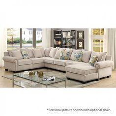 a living room scene with focus on the sectional sofa and coffee table in the middle