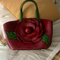 100% Genuine Leather: Made Of High Quality Genuine Leather With Creative Handmade Flower, Durable Fabric Lining, Golden Color Hardware. Bottom With 4 Rivets Could Protect The Handbag Away From Abrasion. Dimensions: L 12.5 X W 4.5 X H 12.5 Inch; Double Handle: 7 Inch; Weight Approx: 1.4 Kg/ 3.08 Lbs. This Handbag Enough To Hold Your 12" Laptop, Ipad, Wallet, Phone And Other Items. Structure: Zipper Closure. 2 Main Compartments, 1 Middle Zipper Pocket, 2 Slip Pockets And 1 Inner Zipper Pocket. Ext Red Bucket Bag With Large Capacity And Top Handle, Red Satchel Bucket Bag With Top Carry Handle, Red Double Handle Bucket Bag With Top Carry, Chic Flower-shaped Shoulder Bag For Everyday Use, Chic Red Handheld Bucket Bag, Elegant Red Bucket Bag With Double Handle, Chic Flower-shaped Bag For Daily Use, Red Shoulder Bag With Top Carry Handle As Gift, Elegant Flower Shoulder Bag For Everyday Use