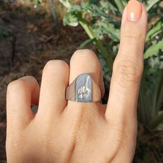 "This signet ring is cast in lead-free pewter. The ring size when cast is 7.25. The sealing image is a hand pointing. As if to say \"that way\" This is part of a series of signet rings I am making cast from lead-free pewter. Each master ring is hand sculpted to give a unique, rustic style, multi-dimensional relief image when used as a stamp to seal, with sealing wax." Hand Pointing, Finger Pointing, Pewter Ring, Pointing Hand, Resize Ring, Multi Dimensional, Signet Rings, Sealing Wax, Seal Stamp