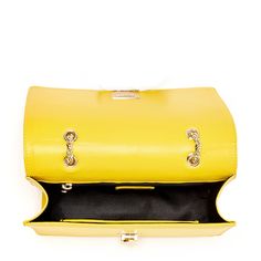 The Josie will take you through the seasons looking trés chic. Made with smooth leather, this trendy forward yellow leather purse features decorative leather studs on its front flap. With a buckle closure, the fabric-lined interior includes a zip pocket, cell phone slip and 6 credit card slots. Its elegant light gold chain strap can be worn long as a stylish crossbody or doubled up for a shorter shoulder bag style. The fashionable Josie worn day to night for all occasions. More details about thi Designer Yellow Office Bag, Yellow Shoulder Bag With Branded Hardware For Travel, Yellow Leather Shoulder Bag With Branded Hardware, Yellow Business Satchel Bag, Trendy Yellow Bag For Formal Occasions, Trendy Yellow Formal Bag, Trendy Yellow Formal Bags, Luxury Yellow Shoulder Bag With Zipper Closure, Luxury Yellow Bag With Zipper Closure