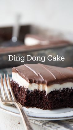 a piece of chocolate cake on a plate with the words ding dong cake above it