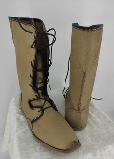 This is handmade genuine leather men's boots. 10.5 us men 44 Eu men. For other size please contact with us. Made with natural leather. On boots there is little stains. There is flat leather sole. Very comfy and usefull. We have door to door express shipping service. Handmade. Natural. Handstitched. İf you have any questions please contact with us. bemyboots.etsy.com Thank you Leather Festival Boots With Rubber Sole, Leather Boots With Rubber Sole For Festival, Medieval Style Brown Lace-up Boots, Medieval Brown Outdoor Boots, Medieval Brown Lace-up Boots, Traditional Leather Boots With Snip Toe, Traditional Leather Boots With Rubber Sole, Medieval Leather Boots With Leather Sole, Handmade Leather Boots With Snip Toe