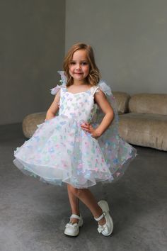 Rainbow butterfly tutu birthday dress with beautiful butterflies lace, flower girl dress with puffy skirt for special occasions, birthday party, wedding, formal event, junior bridesmaid gown.  The dress fastens with a vertical corset and zipper. Specially designed of unique girls dress pattern for your chic special occasions, wedding, birthday, first communion, fun fashion pageant, bridesmaid party. Item material: upper layer of the skirt - satin and tulle, organza middle layer of the skirt - tulle lower layer of the skirt - taffeta corset - satin, tulle, glitter, zipper Item color: blush pink, blue, red, white, black Size: 12-18 - 2-3-4-5-6-7-8-10-12-13 The size chart is the picture of the listing. If your measurements do not match to those specified in the standard size chart, we can com Spring Baptism Tutu Dress With Bow, Summer Ball Gown Dresses, Summer Fairy Princess Dress With Ruffles, White Tutu Dress With Bow For Birthday, Spring Pageant Princess Dress With Bow, Fairy Style Princess Dress With Ruffles For Summer, Summer Pageant Dress With Bow, Summer Wedding Princess Dress Ball Gown, Summer Wedding Ball Gown Princess Dress