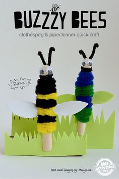 two bugs made out of yarn sitting on top of each other in front of grass