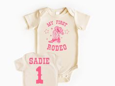 My First Rodeo Baby Bodysuit, Rodeo Birthday, Baby Bodysuit, First Birthday Outfit, Birthday Girl Shirt, First Birthday Shirt, Girl Birthday 💗  Welcome to The WildflowerbyMiley Etsy Shop!  This listing is for the bodysuit, sweatshirt or t-shirt only. All other items that are shown in our photos such as shoes, hats, beanies, blankets etc. are for photo staging purposes and are NOT INCLUDED in the sale. DESCRIPTION:  This baby and children's unisex essential fits like a well-loved favorite. Super 1st Rodeo Birthday Outfit, First Rodeo Outfit Girl, First Rodeo Birthday Party Girl Outfit, First Rodeo Outfit, First Birthday Rodeo Theme, First Rodeo Shirt, Rodeo Baby, Rodeo Gifts, Rodeo Birthday Parties