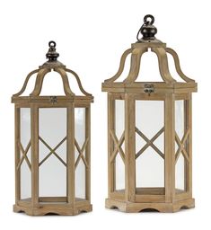 two wooden lanterns sitting side by side