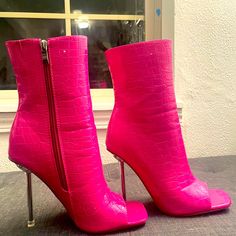 Never Worn, Size 8, Around A 4 Inch Heel. These Statement Boots Are Perfect For Nights Out, Concerts, Or Just Looking Fabulous During The Day. Any White Marks On The Photos Are Due To The Reflection Of Light. These Are In Pristine Condition, And Not As Hard To Walk In As They Look! Pink Pointed Toe Faux Leather Heels, Pink Faux Leather High Heels, Pink Synthetic Heels For Fall, Pink Heels For Night Out In Fall, Pink Faux Leather Party Boots, Fitted Crocodile Pattern Heels With Round Toe, Fitted Round Toe Heels With Crocodile Pattern, Party Boots With Crocodile Pattern, Fitted Crocodile Pattern High Heels