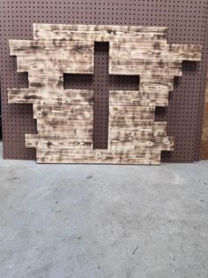 This is our small wooden cross made from pressure treated wood.  The boards have been sanded smooth just not painted or stained.  We use Minwax stain and can accommodate any color offered through Minwax.  If you prefer the unfinished product contact seller for discounted price.