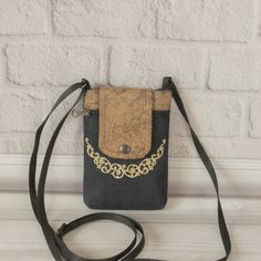 You can also choose another design: https://etsy.me/3rCkAYi This is a crossbody purse for a cell phone that will harmoniously complement your outfit. You can also give someone a unique gift (all bags in a single copy). Its dimensions: 6(1/2)" x 4(1/2)" inches    (17 X 12 cm) maximum strap length - 67"  (170 cm)  The bag holds everything you need in a small size - a cell phone, passport, keys, credit cards, money.  Now you will not be worried about the absence of pockets on your clothes. The belt Small Iphone, Iphone Purse, Iphone Bag, Cell Phone Pouch, Cell Phone Bag, Cell Phone Purse, Small Crossbody Purse, Blue Birthday, Bag Patterns To Sew