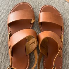 Leather Sandals, Never Worn, 6.5. Brown T-strap Sandals With Adjustable Strap For Vacation, Brown Open Heel Footbed Sandals For Vacation, Brown Open Heel Footbed Sandals For Beach, Brown Open Heel Sandals For Vacation, Double Strap Footbed Sandals With Heel Strap For Beach, Beach Footbed Sandals With Double Strap And Heel Strap, Brown T-strap Sandals With Heel Strap For Vacation, Brown Slingback Sandals With Adjustable Strap For Beach, Open Toe Footbed Sandals With Adjustable Strap For Vacation