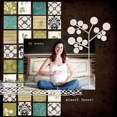 a pregnant woman sitting on top of a bed in front of a quilted wall