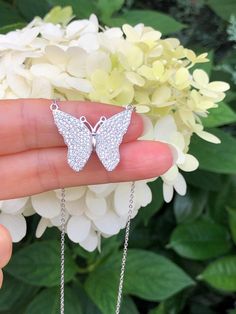 925 Sterling Silver Cz Butterfly Pendant Necklace  - Metal: 925 Sterling Silver 925 (Finish: Rhodium Plated) - Stone: Clear Cubic Zirconia, Pave - Shape: Butterfly - Pendant Dimension: 25mm(0.98 in) x 21mm(0.83 in), Thickness 1mm - Light Cable Chain: 16.75" adjustable (14.75" + 1" + 1"), Lobster Clasp - Color: Silver Sparkling Silver Cubic Zirconia Diamond Necklace, Silver Sparkling Diamond Necklace In Fine Jewelry Style, Cubic Zirconia Necklaces With Pave Setting As Gift, Gift Cubic Zirconia Necklaces With Pave Setting, Cubic Zirconia Necklaces With Pave Setting, Sparkling Sterling Silver Diamond Necklace Gift, Sparkling Sterling Silver Diamond Necklace In White Gold, Sterling Silver Diamond Necklace With Pave Setting, Sparkling Silver Sterling Silver Necklace