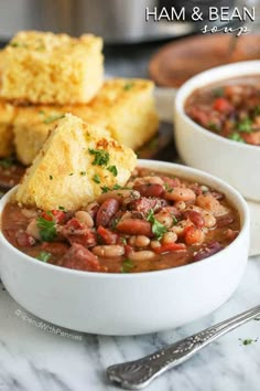 two white bowls filled with beans and cornbreads